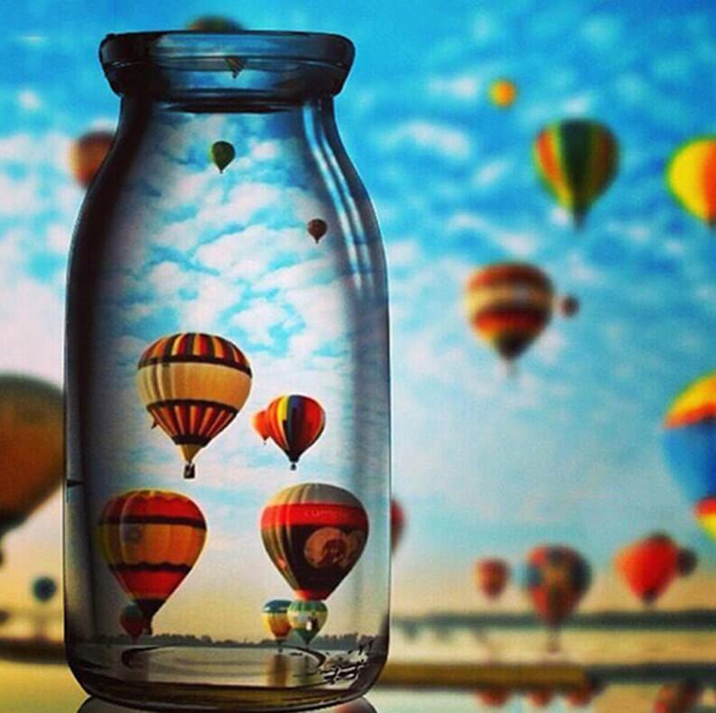 Air Balloons Captured in Glass Bottle